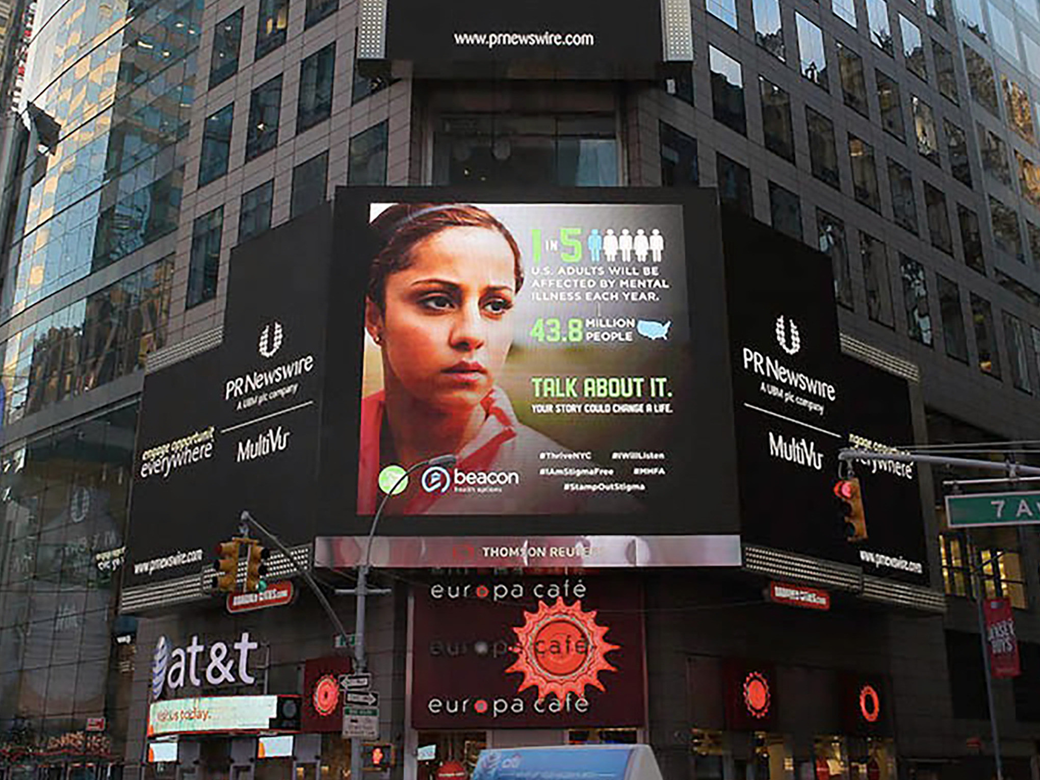 Stamp Out Stigma — the creative on the main screen, flanked by the campaign message on the boards above and beside it
